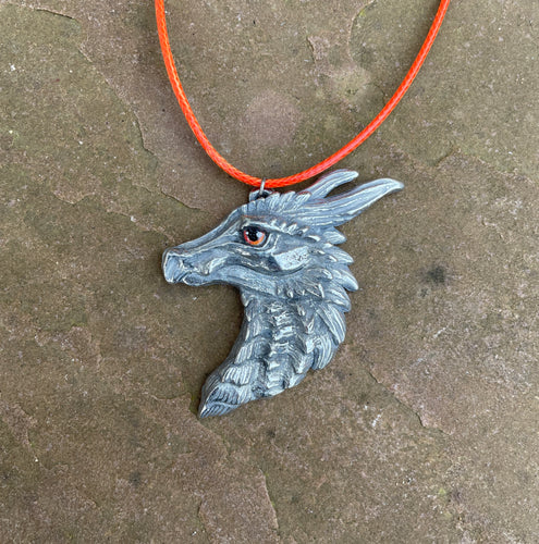 Orange Eye Dragon Head Pewter Pendant